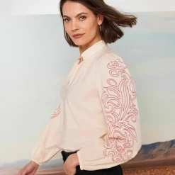 Blouse col montant, manches blousantes imprimées