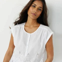 Blouse en broderie anglaise, sans manches