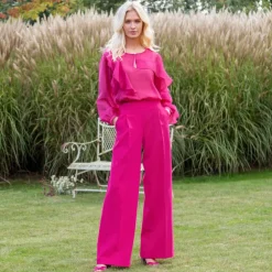 Blouse fluide à volants asymétriques, unie