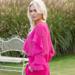 Blouse fluide à volants asymétriques, unie