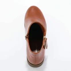 Boots bi-matière, zippées et cloutées