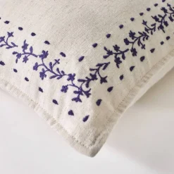 Coussin encadrement brodé Folk