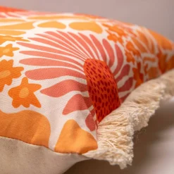 Coussin fleurs colorées finitions franges