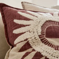 Coussin texturé motif soleil