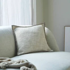 Coussin uni coton texturé