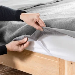 Couverture bicolore Courtelle® mi-housse 420 g/m²