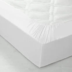 Drap-housse uni coton bonnet 32 cm