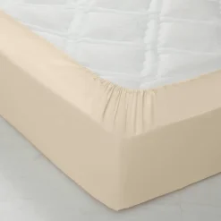 Drap-housse uni coton bonnet 32 cm
