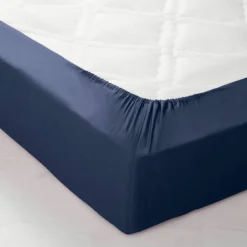 Drap-housse uni coton bonnet 32 cm