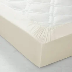 Drap-housse uni coton bonnet 32 cm