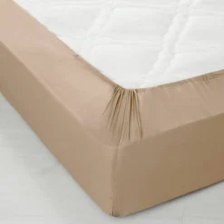 Drap-housse uni polyester-coton 57 fils/cm² - bonnet 32 cm