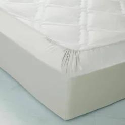 Drap-housse uni polyester-coton 57 fils/cm² - bonnet 32 cm