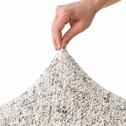 Housse bi-extensible microfibre effet faux uni pour fauteuil et canapé