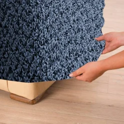 Housse bi-extensible microfibre effet faux uni pour fauteuil et canapé