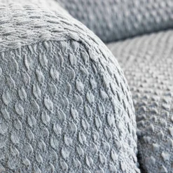 Housse gaufrée bi-extensible canapé fauteuil accoudoirs