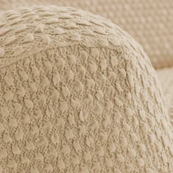 Housse gaufrée bi-extensible canapé fauteuil accoudoirs