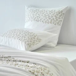 Linge de lit blanc brodé feuillage Colombine®