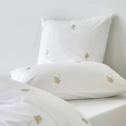 Linge de lit blanc brodé fleurs Colombine®