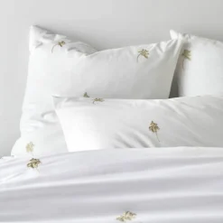 Linge de lit blanc brodé fleurs Colombine®