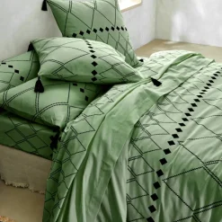 Linge de lit Massaï coton à motifs graphiques et finitions pompons