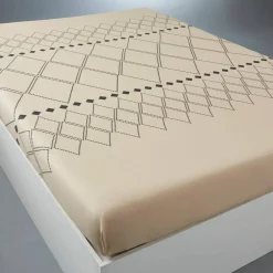 Linge de lit Massaï coton à motifs graphiques et finitions pompons