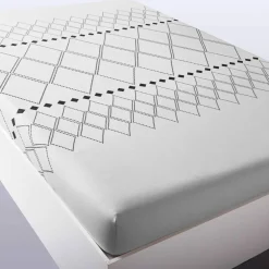 Linge de lit Massaï coton à motifs graphiques et finitions pompons