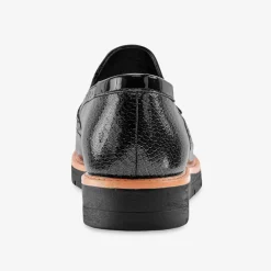 Mocassins compensés à franges et pompons