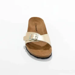 Mules plates cuir à boucle réglable