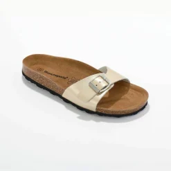 Mules plates cuir à boucle réglable