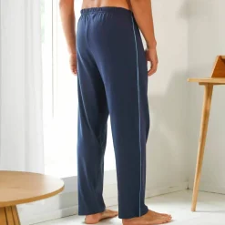 Pantalon pyjama uni coton piping contrasté