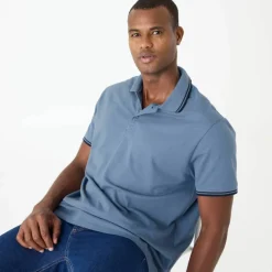 Polo uni maille piquée manches courtes