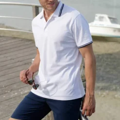 Polo uni maille piquée manches courtes
