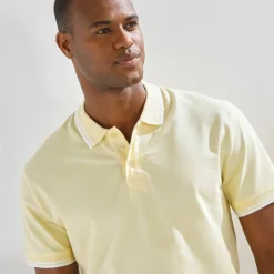 Polo uni maille piquée manches courtes