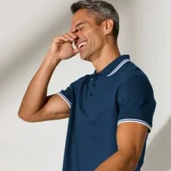 Polo uni maille piquée manches courtes
