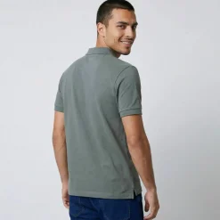 Polo uni maille piquée manches courtes