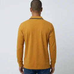 Polo uni maille piquée manches longues