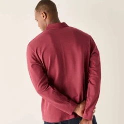Polo uni maille piquée manches longues