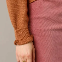 Pull col montant, finition frisotti