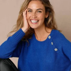 Pull épaule boutonnée bijoux