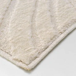 Tapis rectangulaire, motif végétal en relief