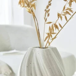 Vase twisté en porcelaine blanche mouchetée